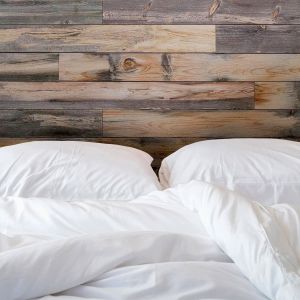Blue-Stained Wood Wall Paneling are a popular choice for interior finishes with its visually striking appearance of blue or gray streaks and patterns.. Features joints that overlap to conceal seams and easy peel and stick backing.