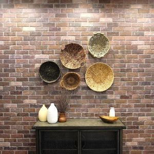 Hampton Brick accent wall panels are a popular choice for interior finishes as they create a warm and inviting atmosphere. Features joints that overlap to conceal seams and easy peel and stick backing.